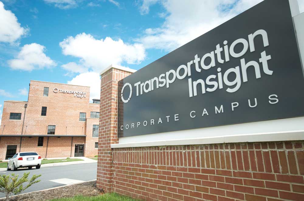 Exterior view of brick buildling and sign